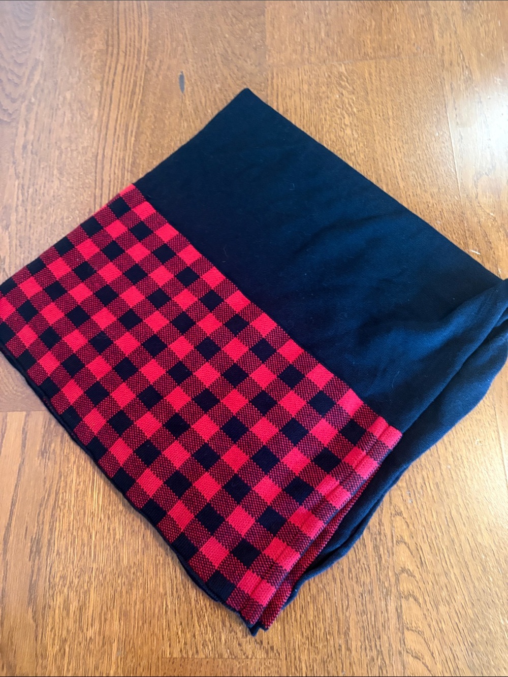 Black and red checkered poncho